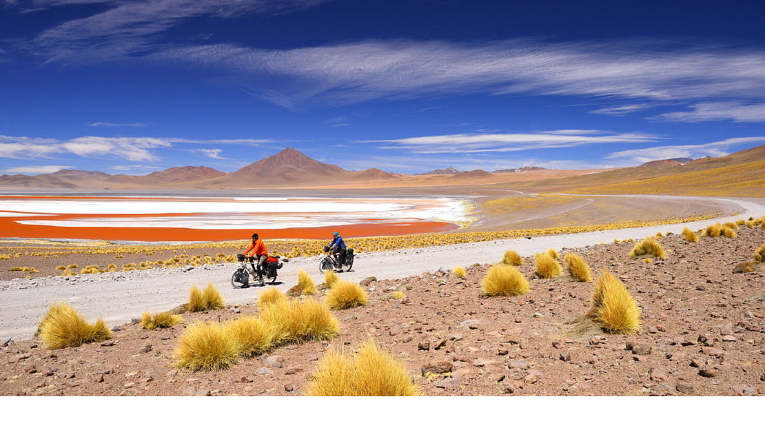 Travel the World Couple cyling in Colorado