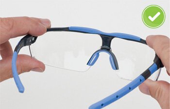 Handle your glasses by holding the frame Handle your glasses by holding the frame