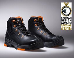German Design Award Special 2016 for uvex 2 uvex 2 black and orange safety boots on grey background