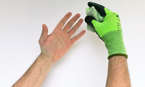 Step 3 in removing uvex gloves safely