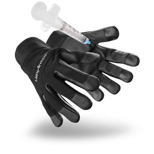 Gant de protection avec seringue illustrant la protection contre les piqûres d'aiguille