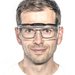 Man with rectangular prescription spectacles and uvex OTG plus overspecs