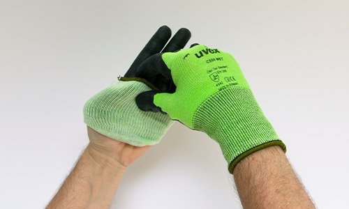 Step 2 in removing uvex gloves safely