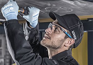 Male worker wearing uvex safety eyewear