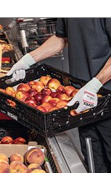 Self-sanitising glove for use in retail