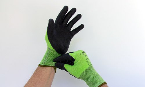 Step 1 in removing uvex gloves safely