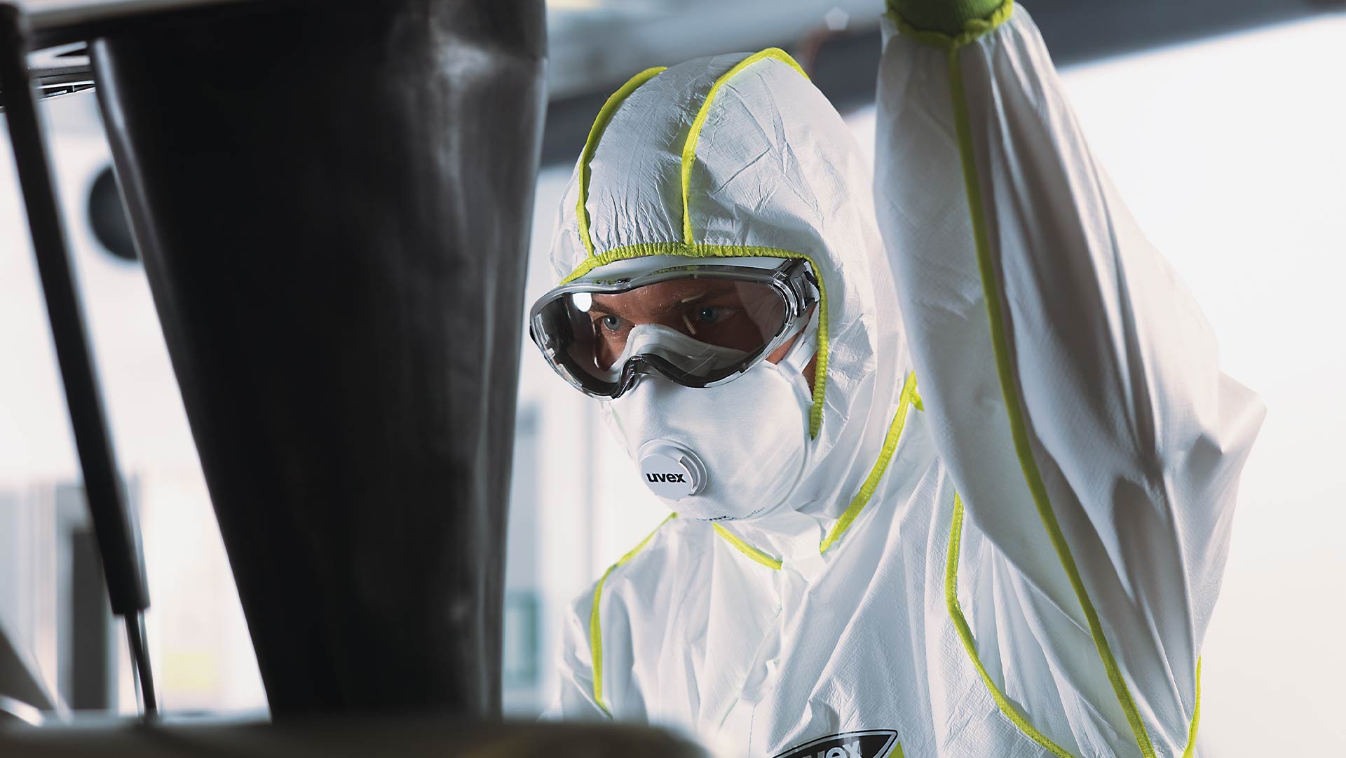 Male employee wearing uvex respiratory mask