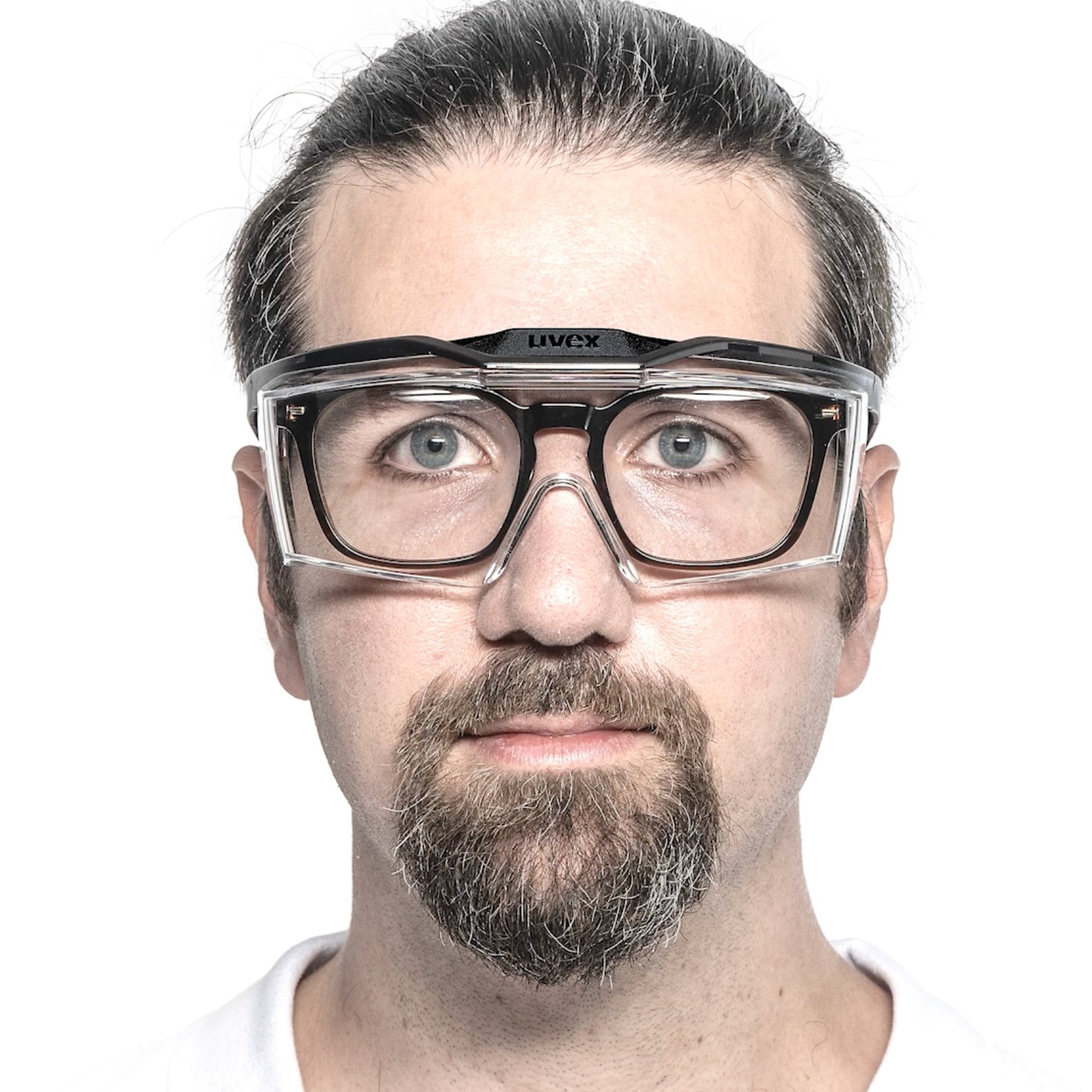 Man with angular prescription spectacles and uvex OTG plus overspecs