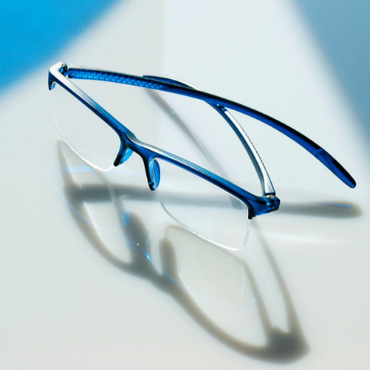 reading glasses miami blue on glass plate