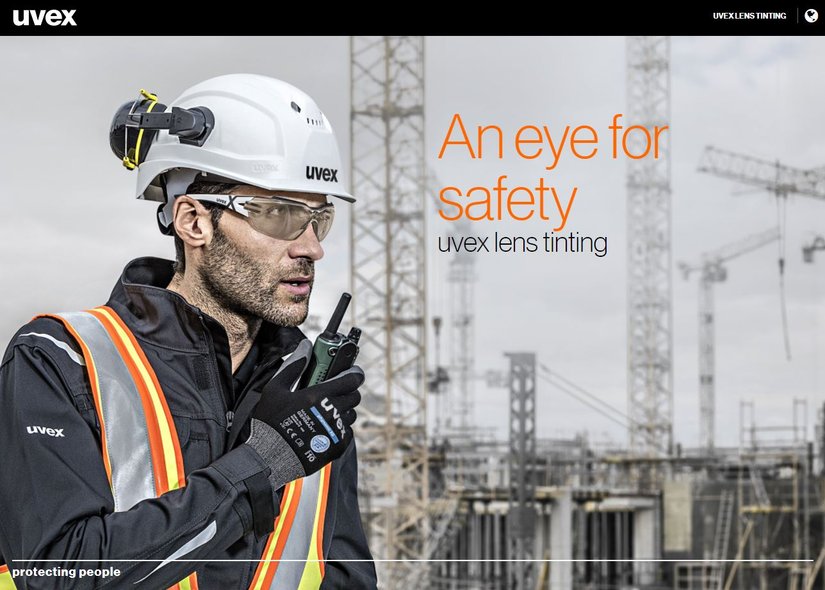 Male worker wearing uvex CBR65 tinted safety glasses