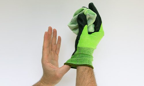 Step 4 in removing uvex gloves safely