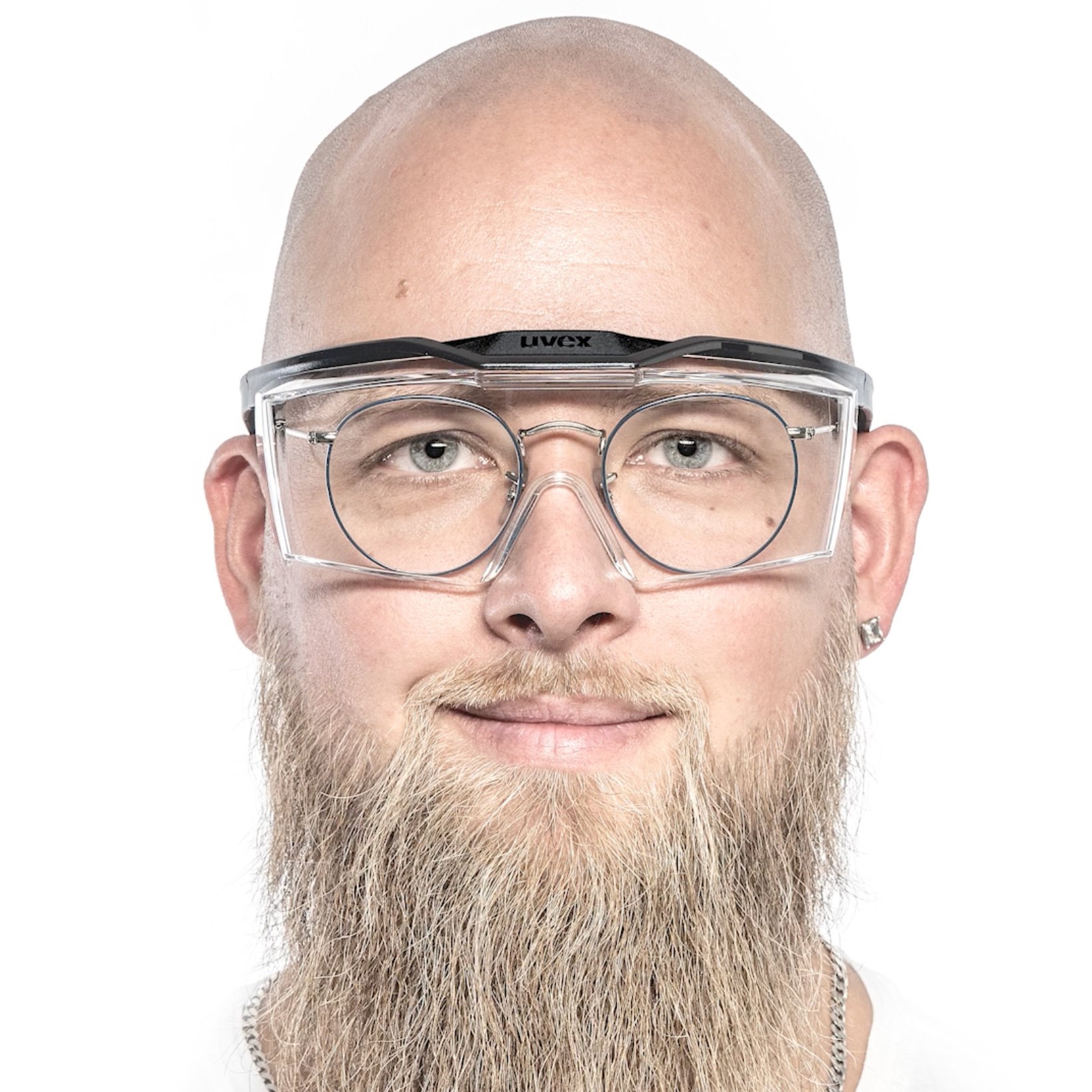 Man with round prescription spectacles and uvex OTG plus overspecs